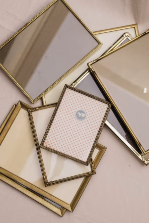 Set of 7 brass frames